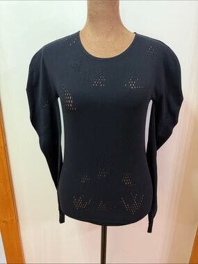 Alexander McQueen. Long Sleeve Top with Laser Cut. NWOT. Size Medium. Stretch